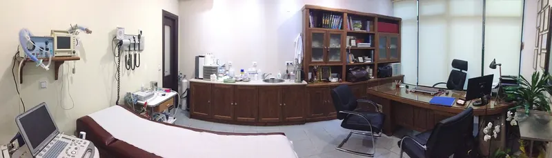 Doctor's consulting room with examination bed